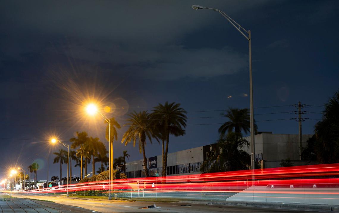 Traffic makes its way past non-working streetlights near the intersection of Northwest 36th Street and Milam Dairy Road on Tuesday, Sept. 3, 2024, in Miami, Fla. There is a meeting at 7 p.m. Monday, Sept. 9, at Virginia Gardens Village Hall to discuss the non-operational streetlights along Northwest 36th Street.
