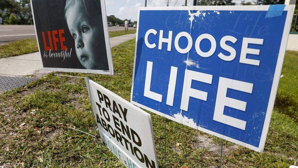 Pro-life signs are seen outside the All Women’s Health Center of Clearwater on Tuesday, May 3, 2022.