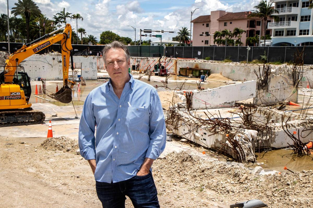 Attorney Michael I. Goldberg, a South Florida lawyer playing a pivotal role in the Champlain Towers South lawsuits, stands in the parking deck, all that remains of the collapsed Surfside condo.