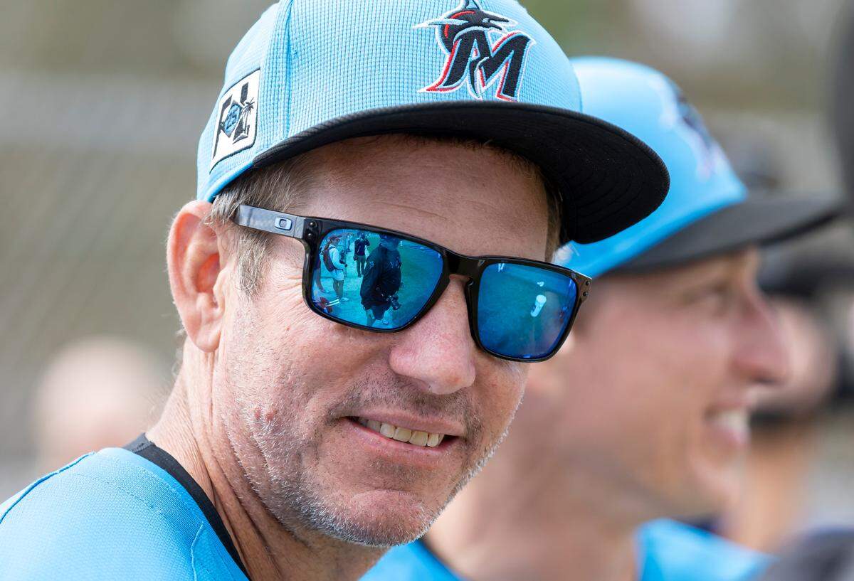 Miami Marlins manager Clayton McCullough (86) watches players run drills during first full-squad spring training workouts at Roger Dean Chevrolet Stadium on Monday, Feb. 17, 2025, in Jupiter, Fla.