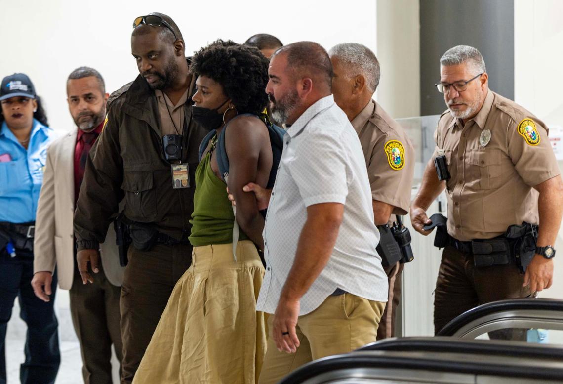 Z Spicer is arrested after being forcibly removed from the commission chambers by officers during a Miami-Dade County Commission meeting at the Stephen P. Clark Center on Thursday, June 26, 2025, in Miami.
