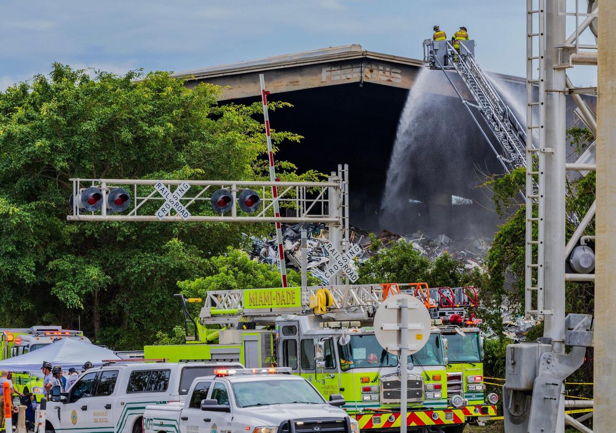 Several Miami-Dade Firefighters units battled a large fire at the Ferrous Processing and Trading scrap metal facility located at 3700 NW North River Drive, in Miami, on Thursday April 10, 2025.