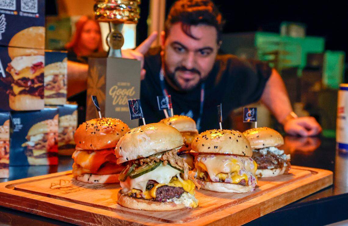 Chef Renzo Cocchia, co-owner of La Birra Bar, serves up Smash Golden Chimichurri at Burger Bash in 2025 at the South Beach Wine & Food Festival. La Birra Bar won the 2025 People’s Choice award.