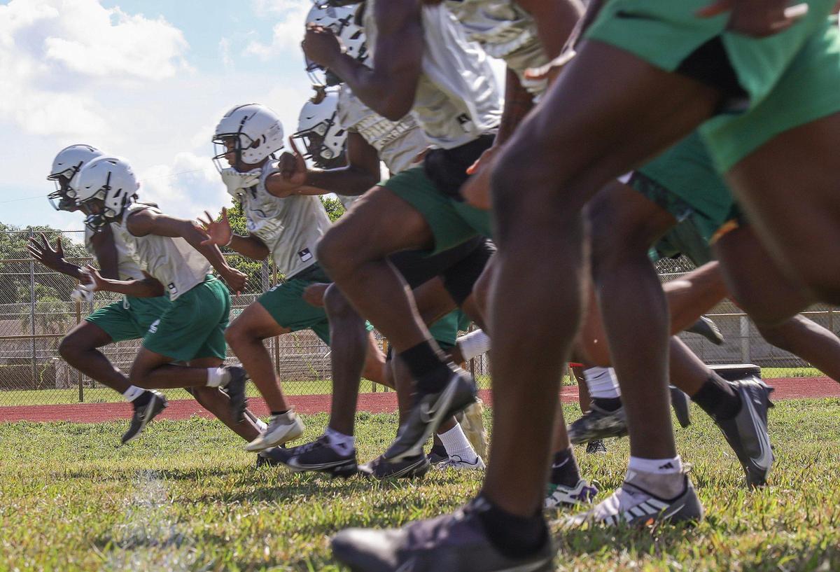 On Wednesday, August 3, 2022 Miami Central High football team conduct sprints during practice at Miami Central High practice field.