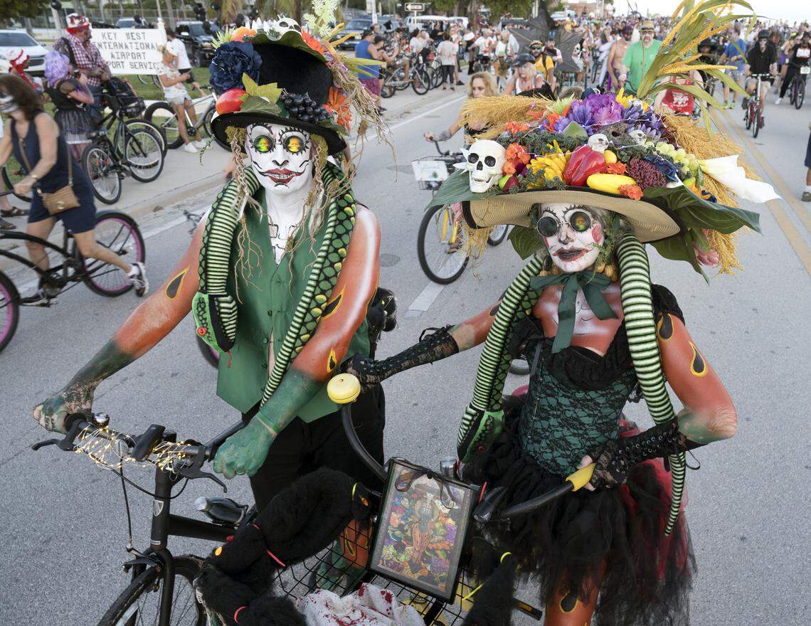 Costumed bicycle riders roll Sunday, Oct. 20, 2019, during the Fantasy Fest Zombie Bike Ride in Key West, Fla.