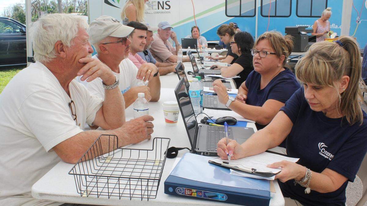 Following 2017’s Hurricane Irma, Upper Keys residents met with Citizens Property Insurance Corp. staff in Key Largo to file claims. But it’s not hurricanes that are causing Citizens to boost rates. The company blames water-damage claims and a practice known as “assignment of benefits.”