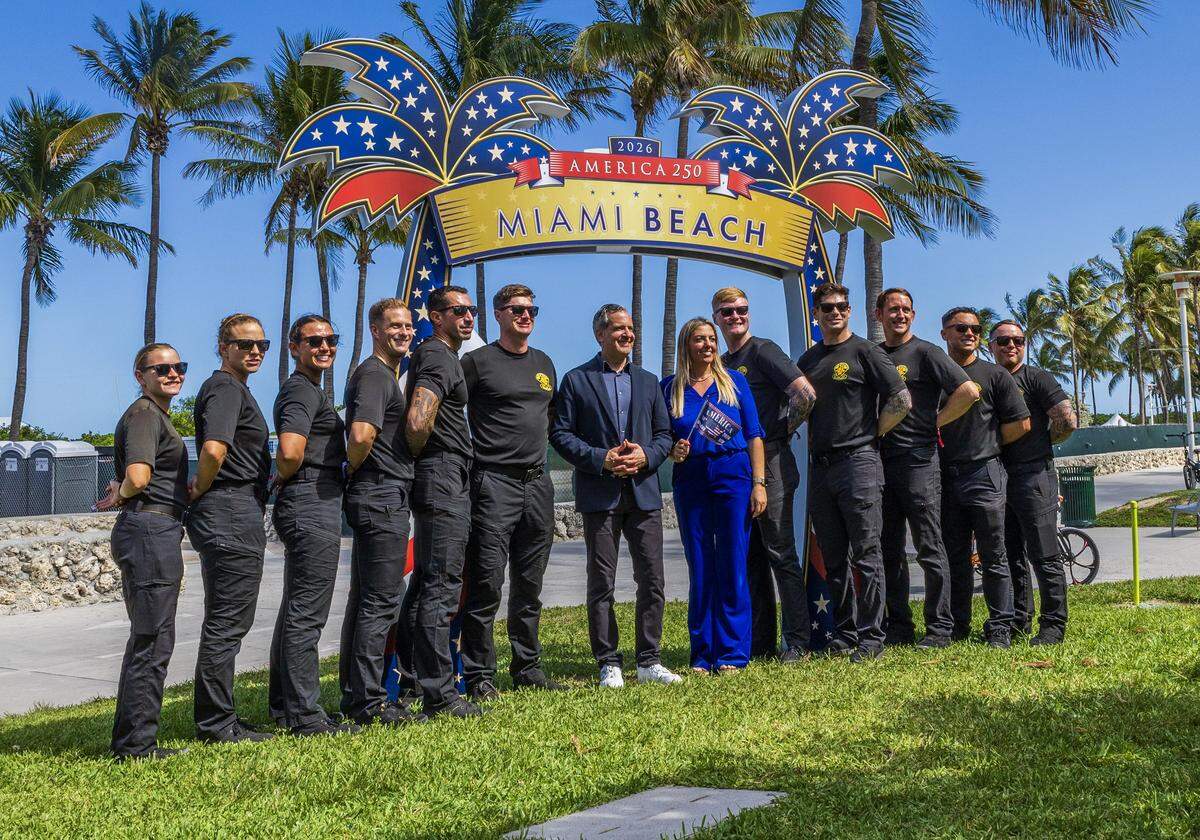 Miami Beach Commissioner Monica Matteo-Salinas and Mayor Steven Meiner posed with members of the U.S. Army Golden Knights parachute team during the unveiling “ceremony of the Miami Beach FREEDOM" outdoor exhibition on Thursday May 21 at Galería Ocean Drive in Lummus Park (between 11th and 12th Streets) to commemorate America's 250th anniversary. The exhibit features 34 weatherproof panels honoring American icons and runs through July 15, 2026.