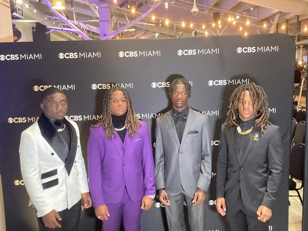 The finalists for the Nat Moore Trophy Award from left to right - Central’s Ezekiel Marcelin, Norland’s Ennio Yapoor, Booker T. Washington’s Ben Hanks Jr. and American Heritage’s Malachi Toney - at the award’s presentation ceremony on Wednesday, Dec. 4, 2024 at Hard Rock Stadium in Miami Gardens, Fla.