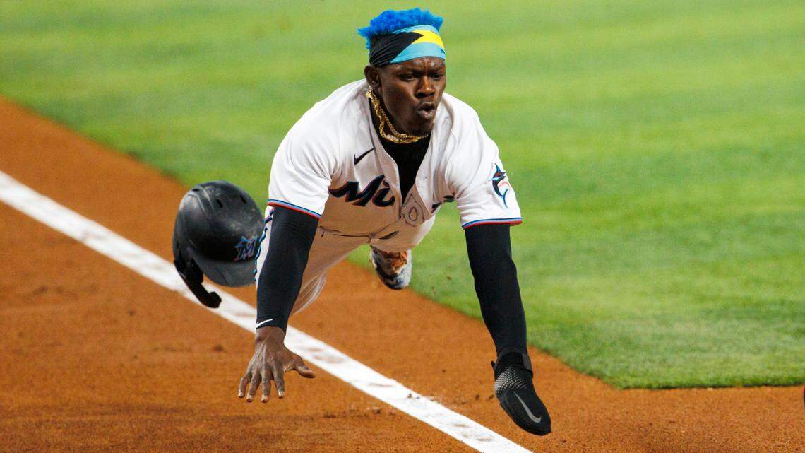 Miami Marlins second baseman Jazz Chisholm Jr. (2) scores during the first inning of a baseball game against the Washington Nationals at LoanDepot Park on Wednesday, May 18, 2022 in Miami, Florida..