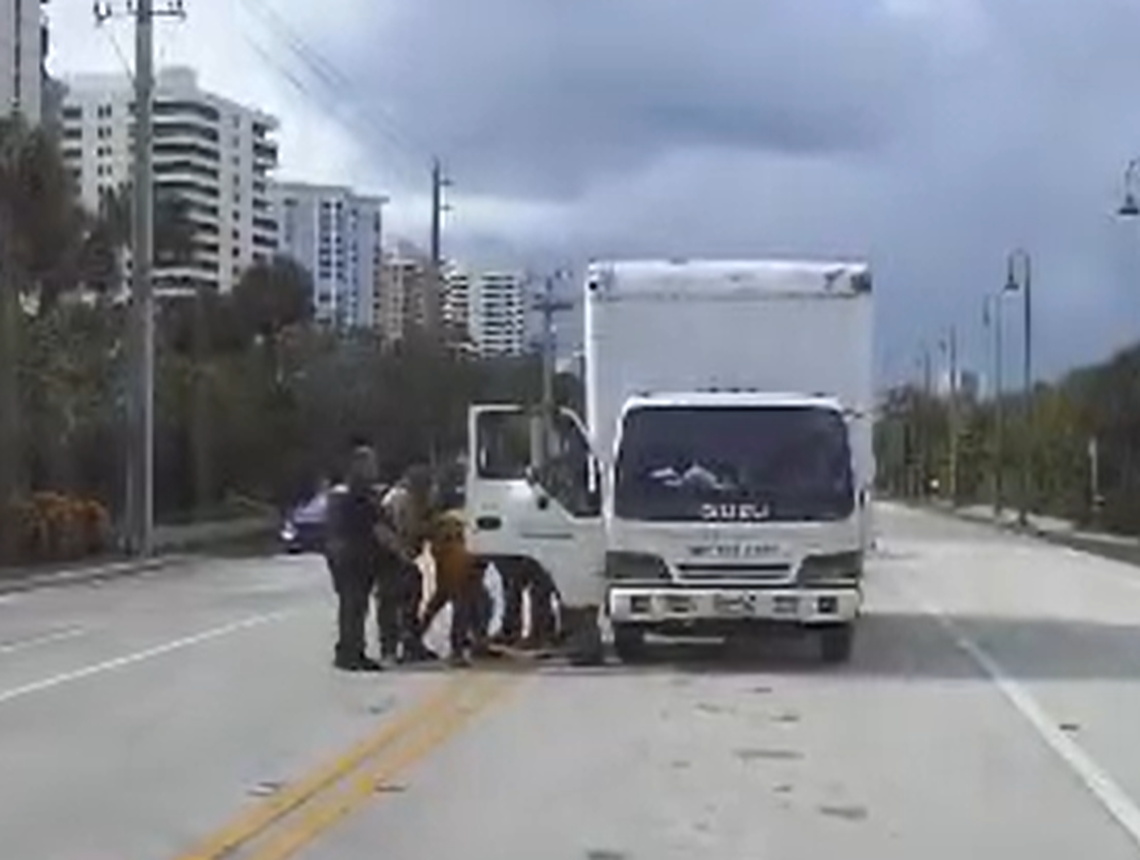 Footage obtained by the Miami Herald of a Florida Highway Patrol camera shows officers from the agency, with U.S. Border Patrol backup, arresting Kenny Laynez Ambrocio and his friends with force on May 2, 2025.