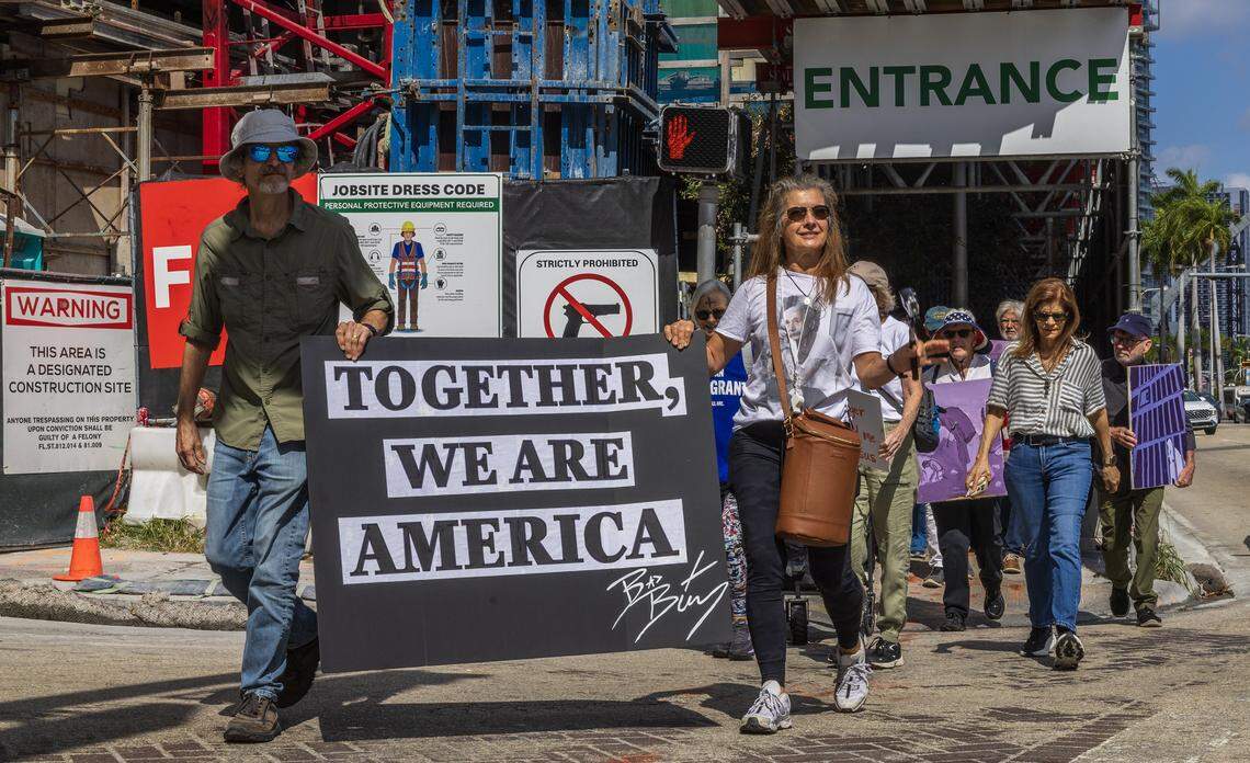 A group of immigrants advocates joined a march along Biscayne Boulevard for Immigrants beginning at First Church Miami and ending at the Immigration Court in downtown Miami, on Wednesday, February 18, 2026.