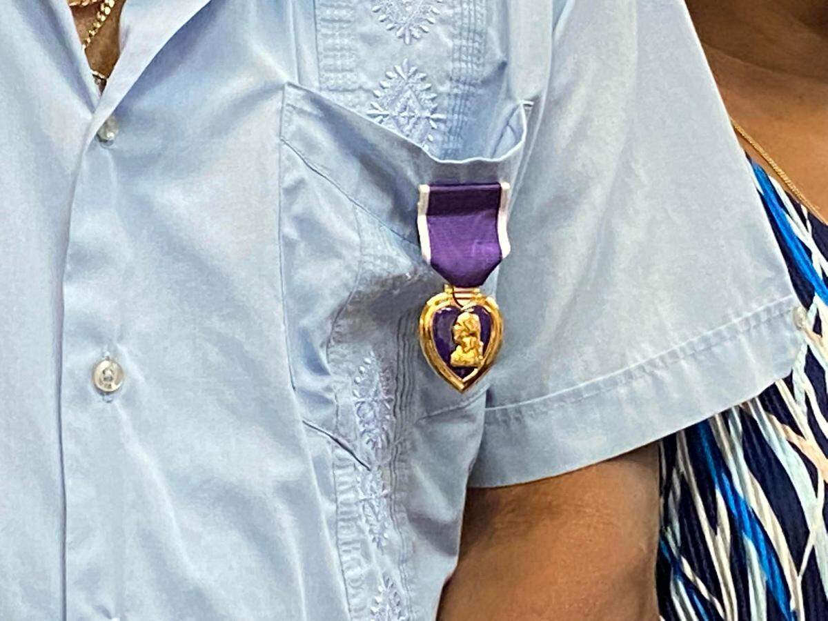 Vietnam War veteran Alvin Lawrence Alce, of Key West, wears a Purple Heart medal on his chest on Aug. 8, 2022, the day he finally received the decoration 53 years after he was wounded in combat.