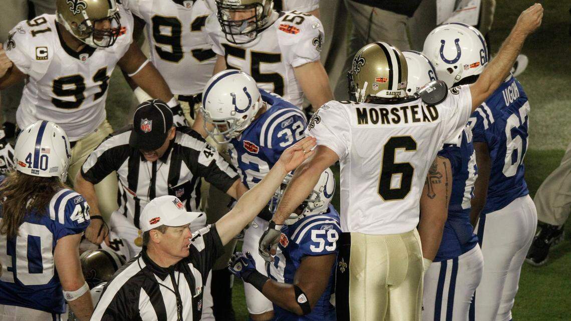 FILE - In this Feb. 7, 2010, file photo, an official signals that the New Orleans Saints will have possession of the ball after an onside kick by Thomas Morstead (6) during the second half of the NFL Super Bowl XLIV football game against the Indianapolis Colts, in Miami. ean Payton risked everything to start the second half of Super Bowl 44. (AP Photo/Charlie Riedel, File)