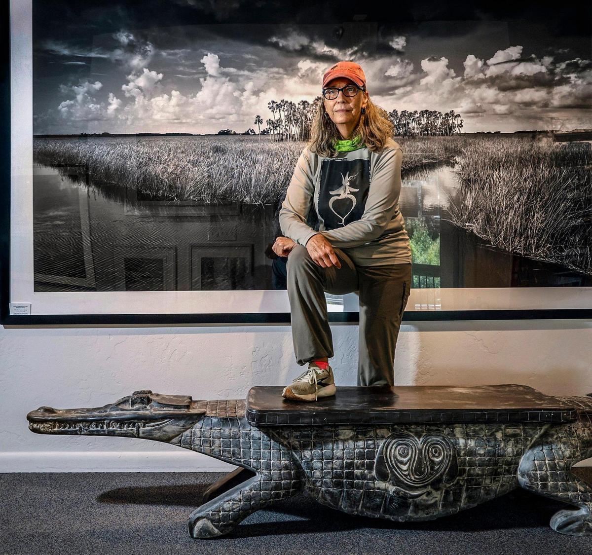 Trish Elser, an employee at Clyde Butcher Big Cypress Gallery off Tamiami Trail in the Everglades, wants people to understand the beauty of the Everglades and is concerned about the impact “Alligator Alcatraz” will have on the area.