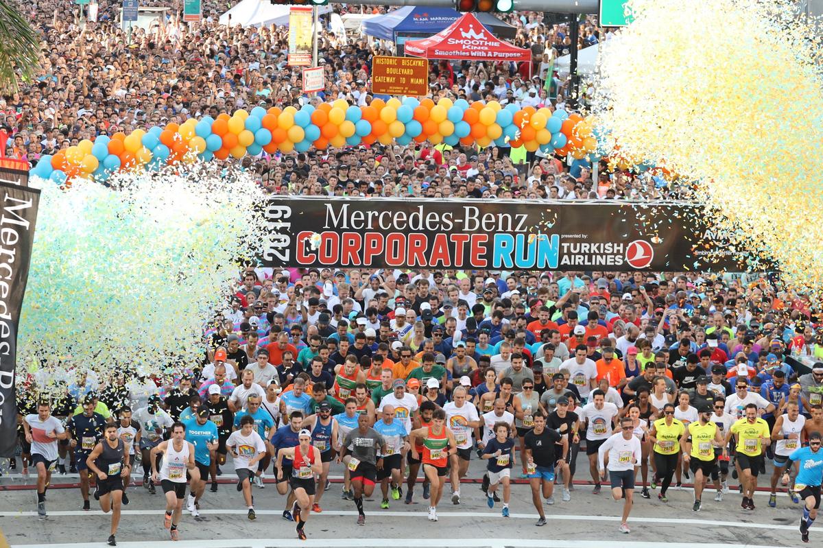 Almost 27,000 participants representing 882 companies run under showering confetti at the start of the 35th annual 5k Mercedes-Benz Corporate Run at Bayfront Park in downtown Miami, Florida on Thursday, April 25, 2019.