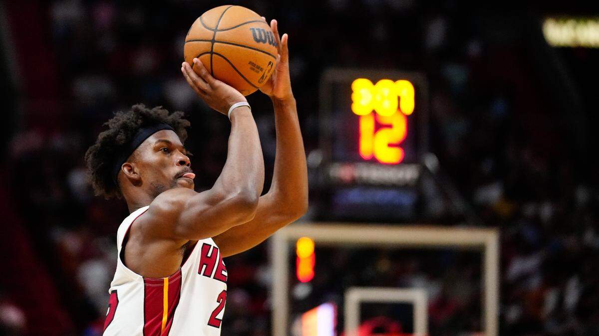 Miami Heat forward Jimmy Butler (22) shoots against the Utah Jazz during the fourth quarter at Miami-Dade Arena.