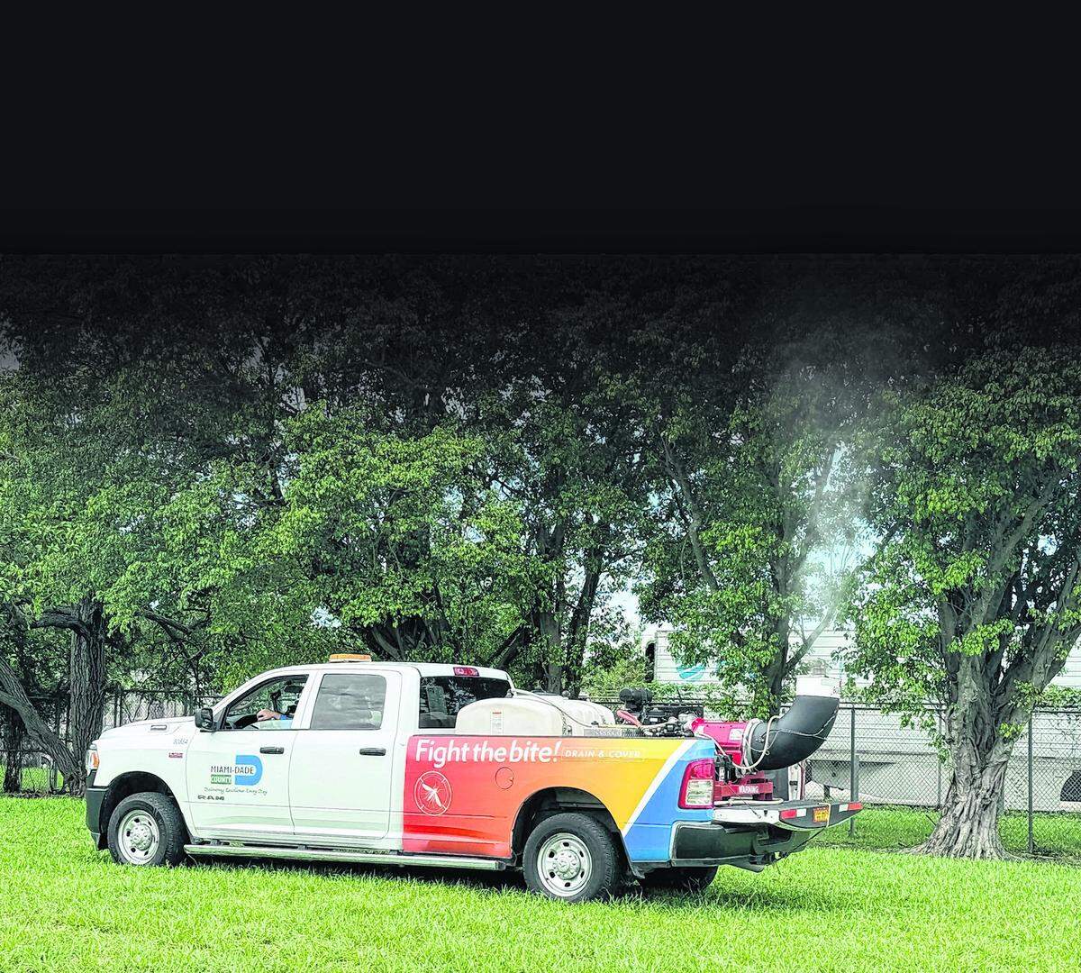 A Miami Dade County Mosquito Control worker uses a truck-mounted sprayer in this demonstration in Doral in 2024.. The county typically expands truck spraying routes for the rainy season.