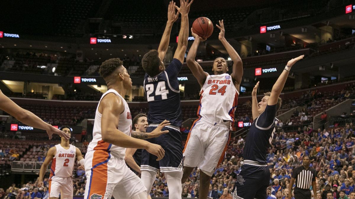 Florida Gators forward Kerry Blackshear Jr. (24) gets inside to shoot in the second half against the Utah State Aggies in the Orange Bowl Classic at the BB&T Center on Saturday.