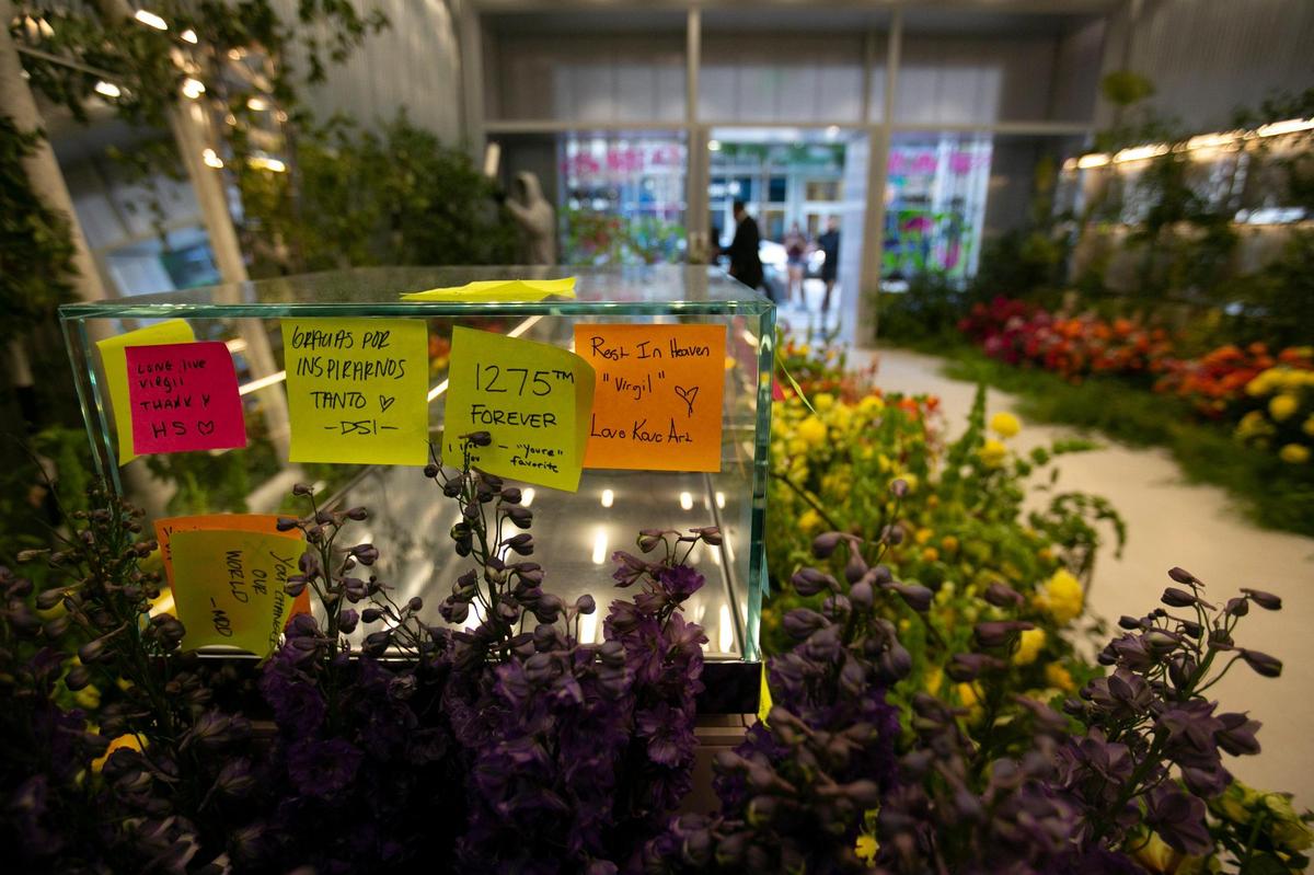 Sticky notes and flowers fill Virgil Abloh’s Off White store in Miami’s Design District, Friday, December 3, 2021. Abloh, artistic director of Louis Vuitton men’s wear as well as the founder of his own brand, Off-White died Sunday at the age of 41.