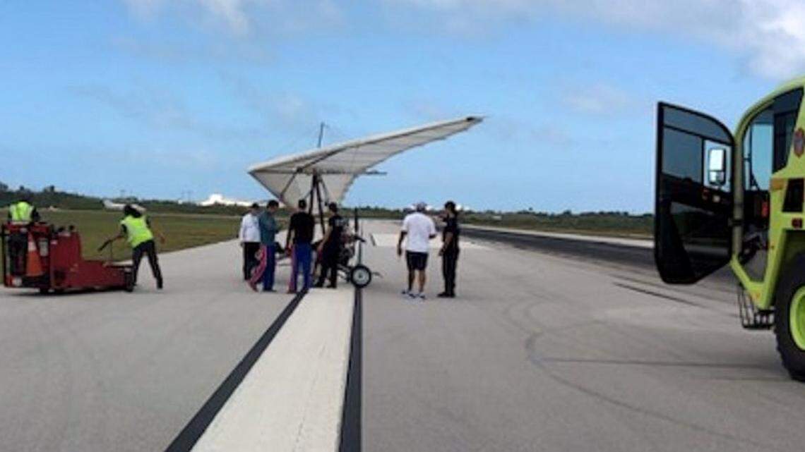Two Cuban migrants landed at Key West International Airport on a motorized hang glider at approximately 10:30 a.m. Saturday, March 25, 2023, according to Monroe County Sheriff’s Office. Officials at the airport gather on the runway near the ultralight aircraft.