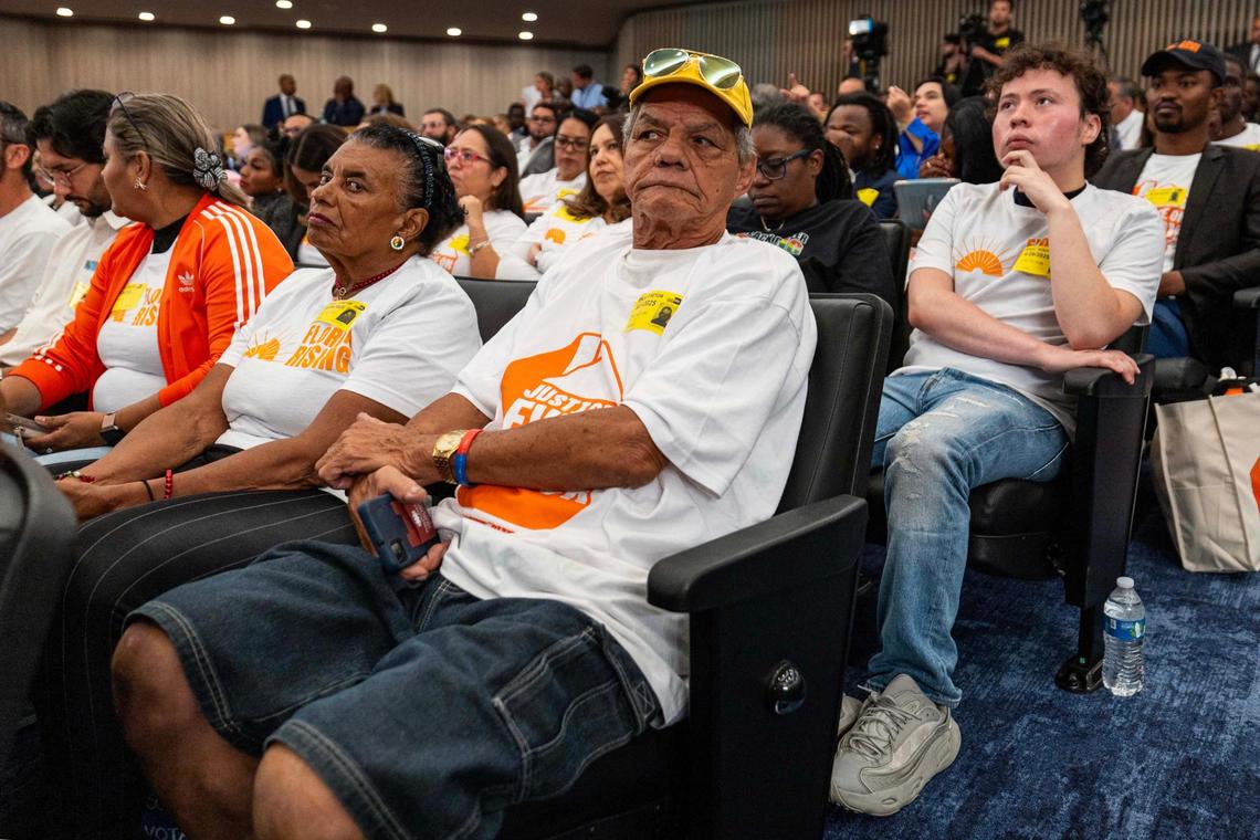 People representing Florida Rising wait for the chance to speak during public comment during a Miami-Dade County Commission meeting at the Stephen P. Clark Government Center on Thursday, June 26, 2025, in Miami.