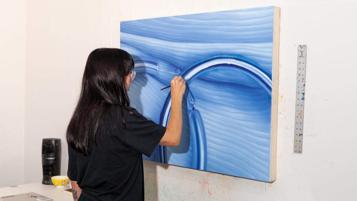 Current Oolite Arts resident Ale Moros creating artwork in her studio in Miami Beach.