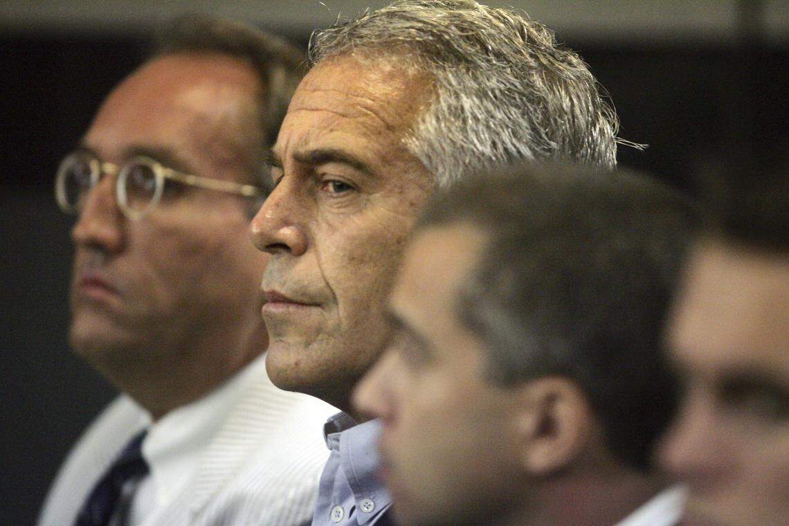 Jeffrey Epstein is flanked by his legal team during a court hearing in the summer of 2008.