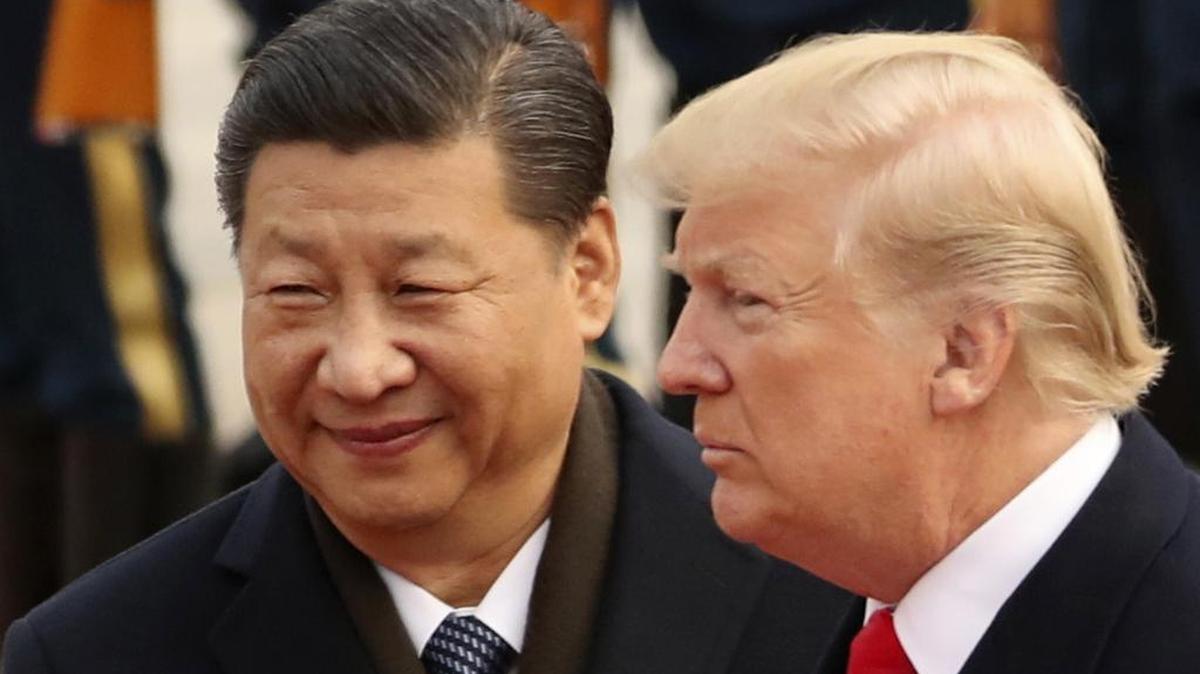 U.S. President Donald Trump and Chinese President Xi Jinping participate in a welcome ceremony at the Great Hall of the People in Beijing, China, on Nov. 9, 2017. The two leaders made their New Year’s resolution early. In December, they agreed to stop trading tariffs for a few months. The first test of that promise for investors comes in the week ahead.