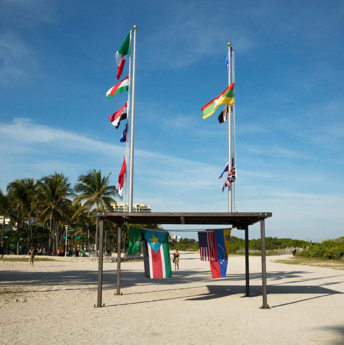  Antonia Wright and Ruben Millares have created a pavilion strung with the constantly moving flags of 16 nations, challenging conventional views of power and underscoring the changing dynamics between the various countries. At the entrance to Untitled, 1200 Ocean Dr. 