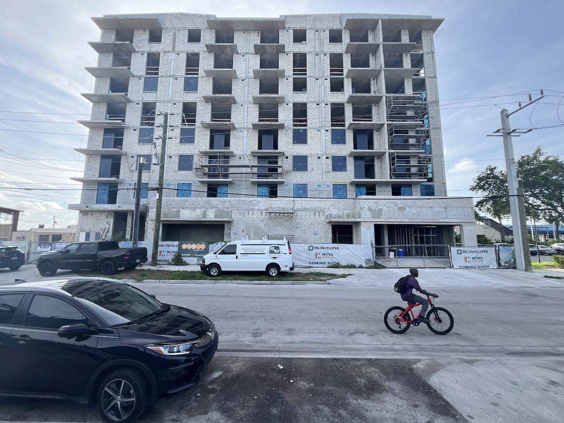 A rental building rises in a new residential transit village near a Tri-Rail station in Hialeah that connects with Metrorail and Brightline.