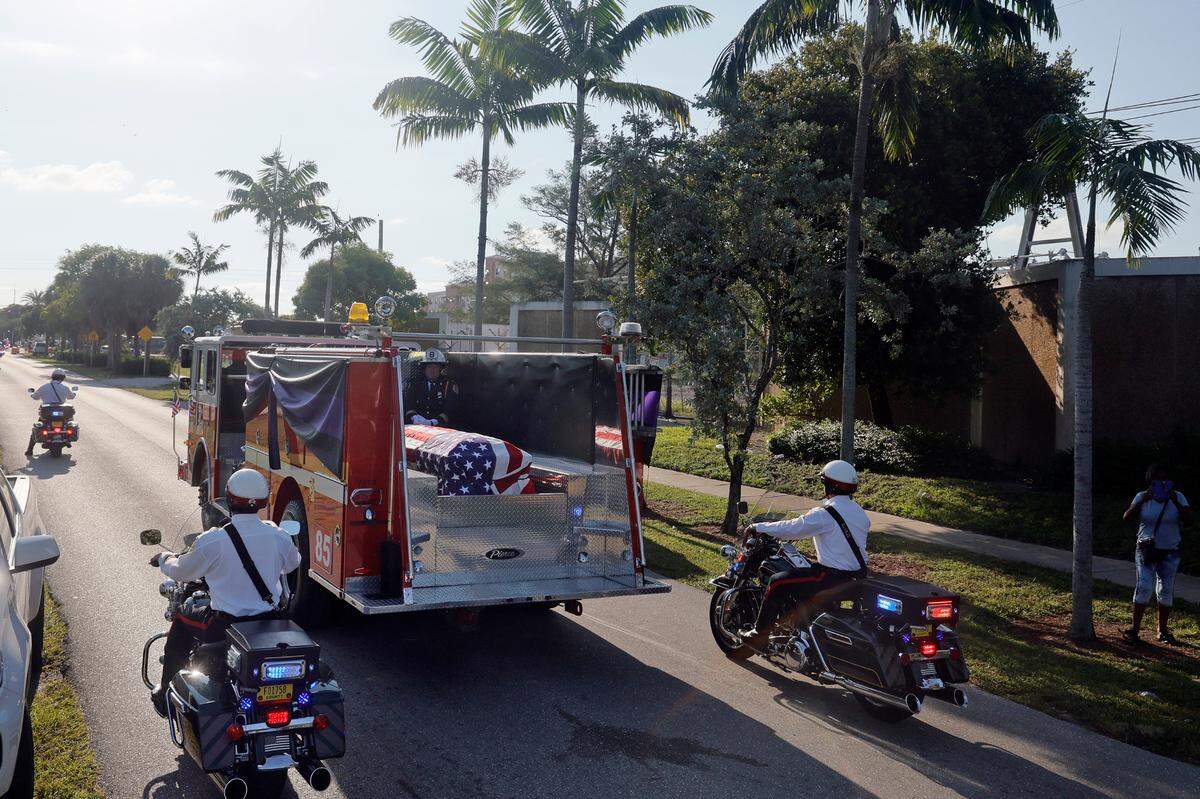 The funeral procession for Broward Sheriff Fire Rescue Battalion Chief Terryson Jackson leaves the L.C. Poitier Funeral Home in Pompano Beach on Friday, Sept. 8, 2023. Jackson died in a helicopter crash on Monday, Aug. 28, when he and two BSFR colleagues were returning to the airport after responding to an emergency call. (Amy Beth Bennett / South Florida Sun Sentinel)