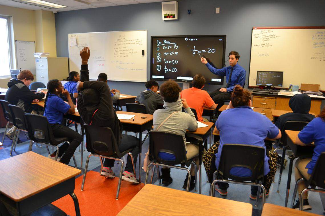 Algebra teacher Ryan Salazar delivers a lesson at Somerset Academy Jefferson County’s middle/high school building on January 29, 2018.