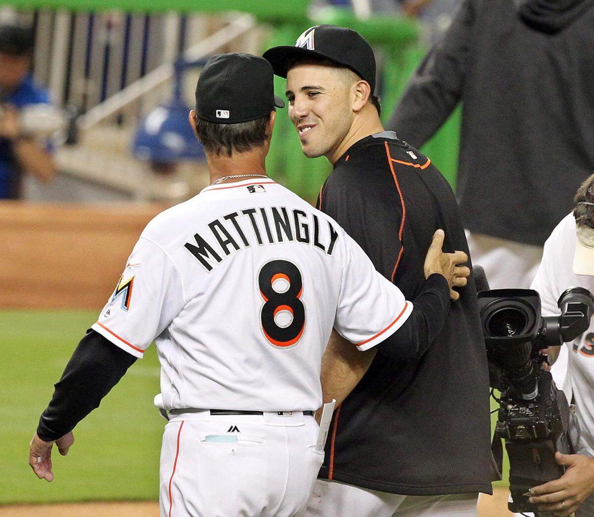 Manager Don Mattingly and pitcher Jose Fernandez celebrate the Miami Marlins’ 4-3 victory against the Arizona Diamondbacks at Marlins Park in Miami on Wednesday, May 4, 2016.