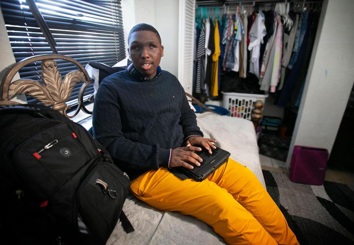 16-year-old Jayden Ferrell, types on his BrailleNote in his bedroom at his grandmother’s home in Key Largo. Ferrell who was born blind uses a BrailleNote to create word documents, go online, listen to music and more. He says ‘it’s like a laptop, sort of, but not one.’ And he says it’s ‘really cool!’