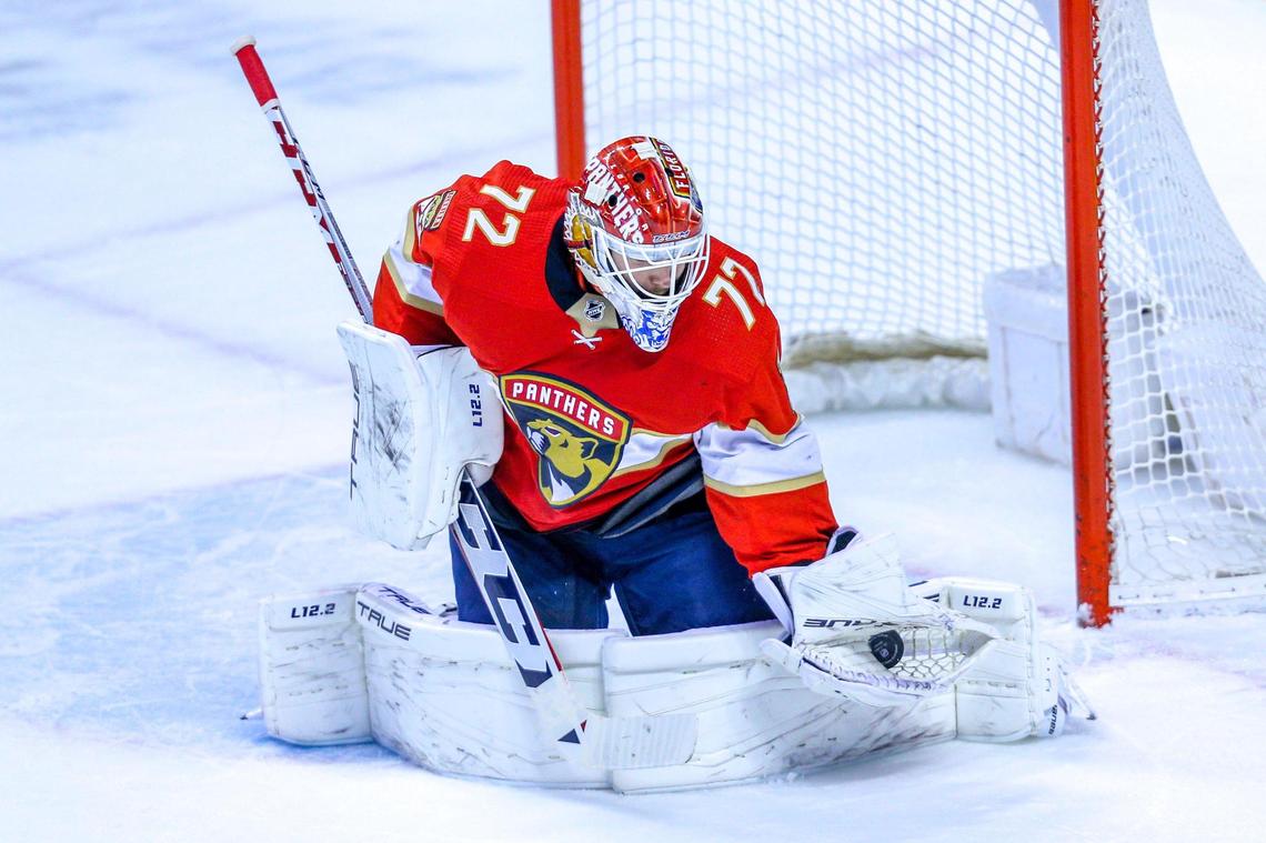 Florida Panthers goalie Sergei Bobrovsky saves a shot by a Calgary Flames player during the first period of an NHL game at FLA Live Arena in Sunrise, Florida, on Tuesday, January 4, 2022.