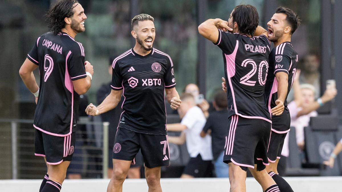 Inter Miami midfielder Rodolfo Pizarro (20) celebrates with his teammate after scoring a goal against Austin FC during the second half of a friendly soccer match at DRV PNK Stadium on Saturday, Feb. 18, 2023, in Fort Lauderdale, Fla.