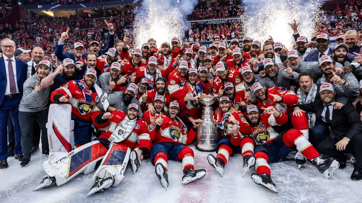 Sunrise, Florida, June 24, 2024 - Panthers celebrate with the Stanley Cup after defeating the Edmonton Oilers in Game 7 of the Stanley Cup Final