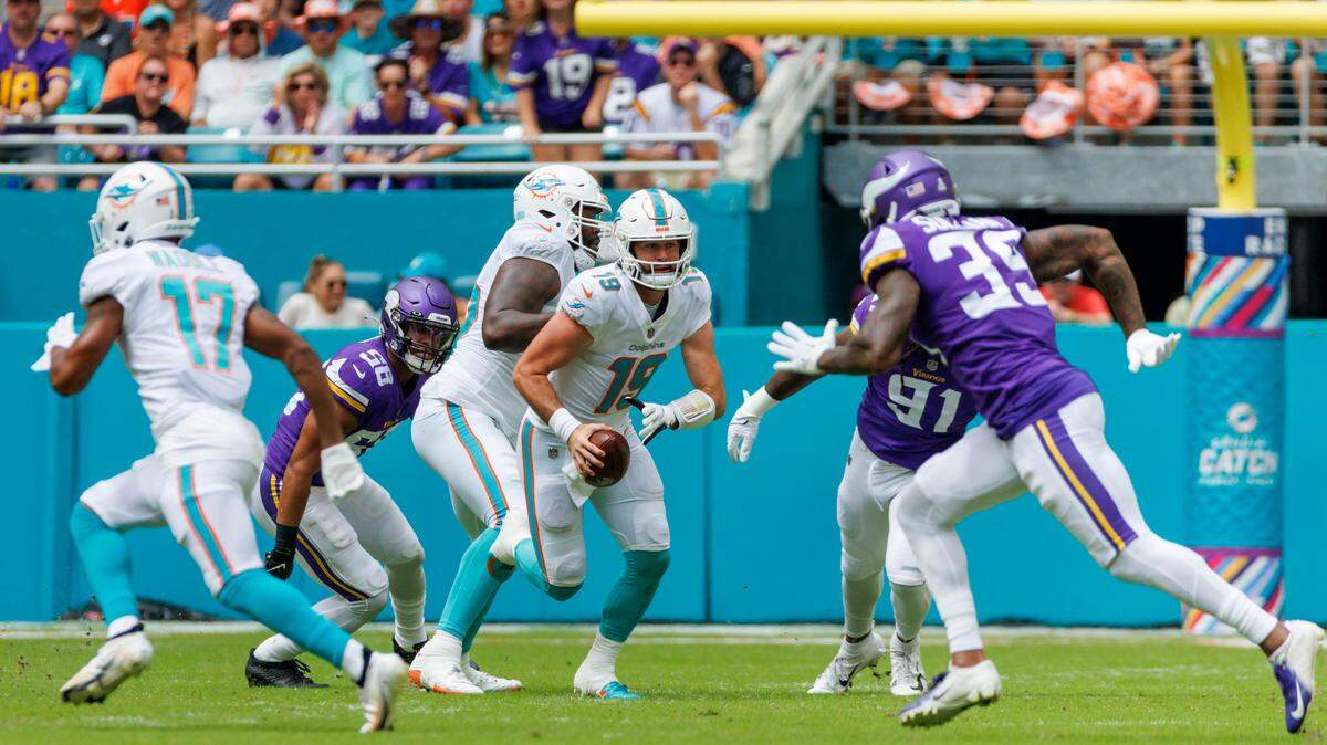 Miami Dolphins quarterback Skylar Thompson (19) scrambles for yardage during first quarter of an NFL football game against the Minnesota Vikings at Hard Rock Stadium on Sunday, October 16, 2022 in Miami Gardens, Florida.