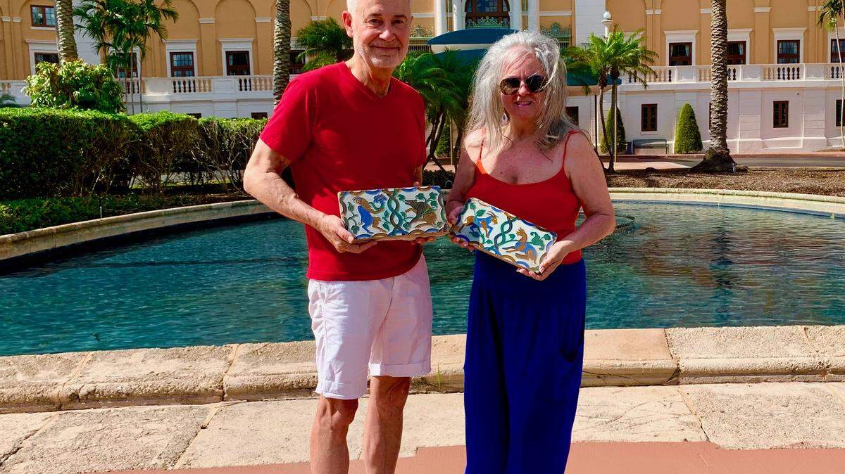 Coral Gables High School graduate Bob Dallas turns over the historic Biltmore tiles to Karelia Martinez Carbonell in June 2024.