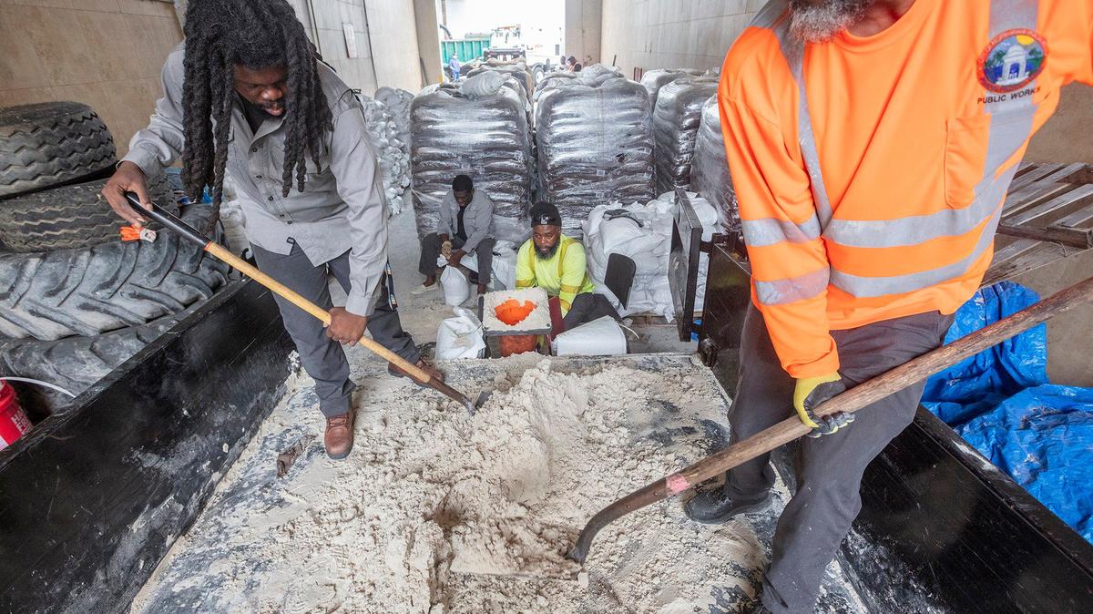 Workers from the City of North Miami Beach prepare sandbags to distribute to residents before the expected flooding ahead of the anticipated Hurricane Milton. The distribution was at 1965 NE 151st Street, North Miami Beach on Saturday Oct. 5, 2024.