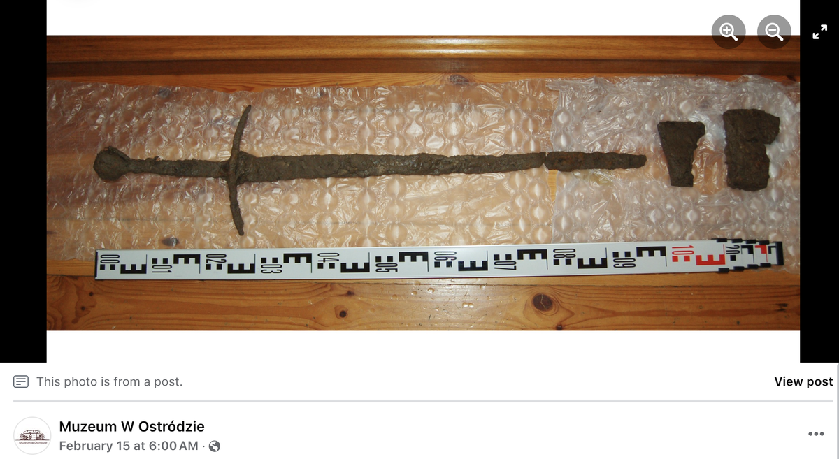 Metal detectorists found a large two-handed sword and two axe heads, officials said.