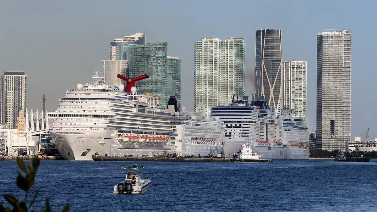 Passengers disembark from an MSC Cruises ship at PortMiami.