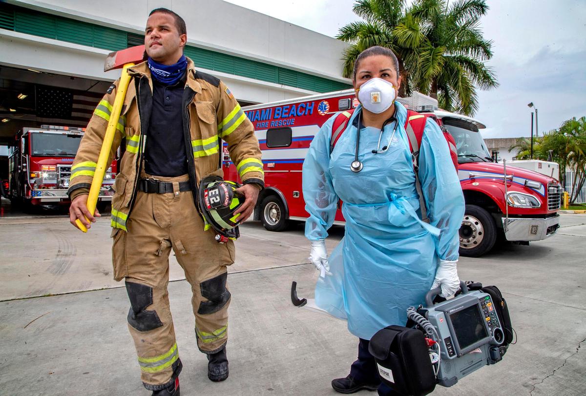 Michael Viera, firefighter and paramedic, and sister Michelle Viera, paramedic and firefighter investigator, Miami Beach Fire Department.