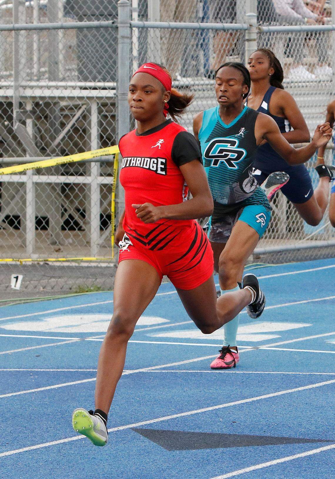 Southridger’s Cynteria James wins girls 100 meter dash during the GMAC Track and Field Championship on Thursday, April 7, 2022 at Traz Powell Stadium in Miami. She set two meet records. Andrew Uloza / for THE MIAMI HERALD