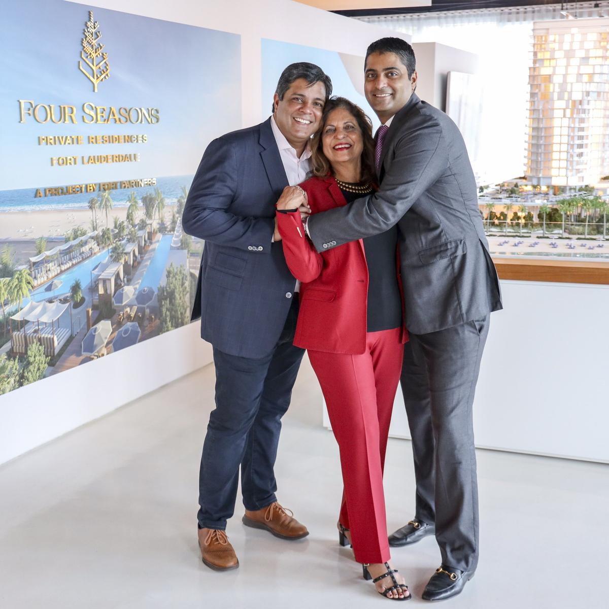 Ramola Motwani, chairwoman and CEO of Merrimac Ventures, is photographed with her two sons Dev, left, and Nitin Motwani inside the sales center of their current development, the Four Seasons Fort Lauderdale Beach on Dec. 18, 2019.