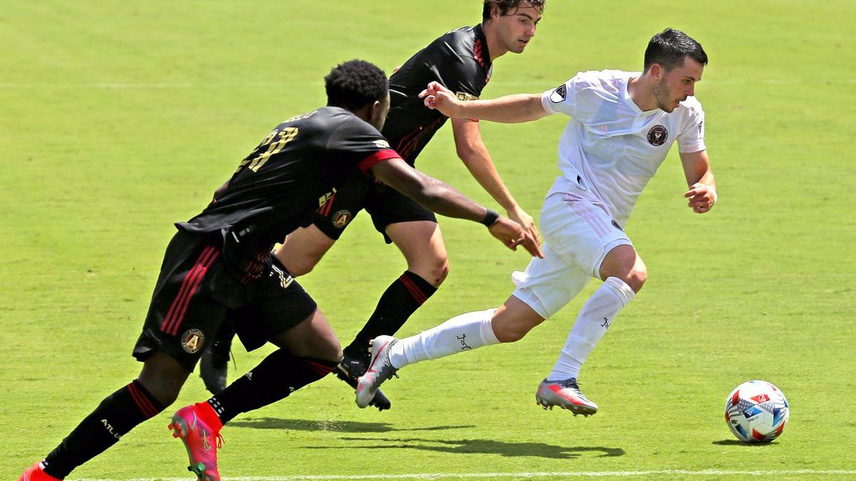 Inter Miami Lewi Morgan (7) prepares to score in the second half as Atlanta United George Bello (21) and Emerson Hyndman (20) defend at DRV Pink Stadium in Fort Lauderdale, Florida, Sunday, May 9, 2021.