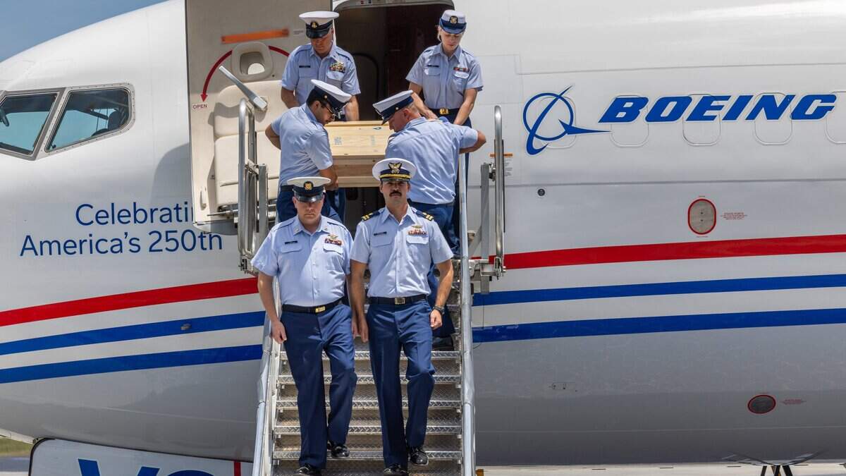 Members of the United States Coast Guard carry founding documents from the Freedom Plane during a ceremony marking the transport of the documents for the 250th anniversary celebration of American independence at Opa-locka Airport in Opa-locka, Fla., on Monday, June 15, 2026.