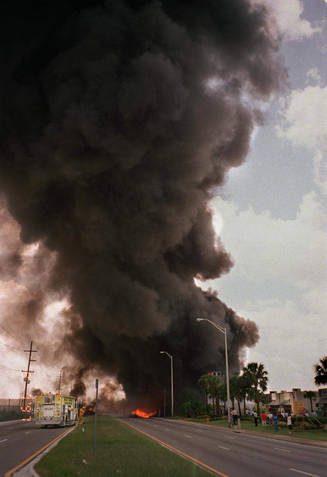 The Fine Air cargo plane in flames near the airport.