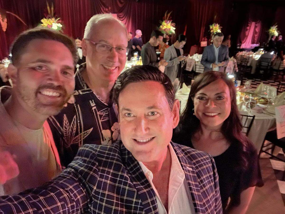 Miami Beach Mayor Dan Gelber (second from left), former Commissioner Michael Gongora (center) and Commissioner Laura Dominguez (right) were among those in attendance at Carbone Beach on May 4, 2023. Tickets to the event were valued at $3,000 apiece.