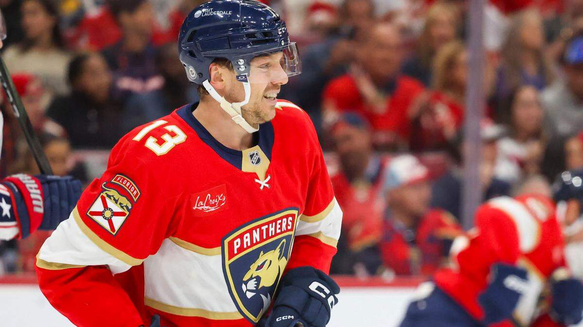 Florida Panthers center Sam Reinhart (13) smiles on the ice after attempting to score a second goal during the first period of a game against the Columbus Blue Jackets on Thursday, March 6, 2025, at Amerant Bank Arena in Sunrise, Fla.